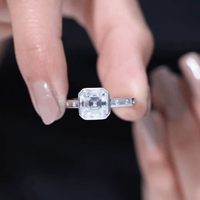 7 MM Asscher Cut Moissanite Solitaire Ring in Bezel Setting with Sleek Accent