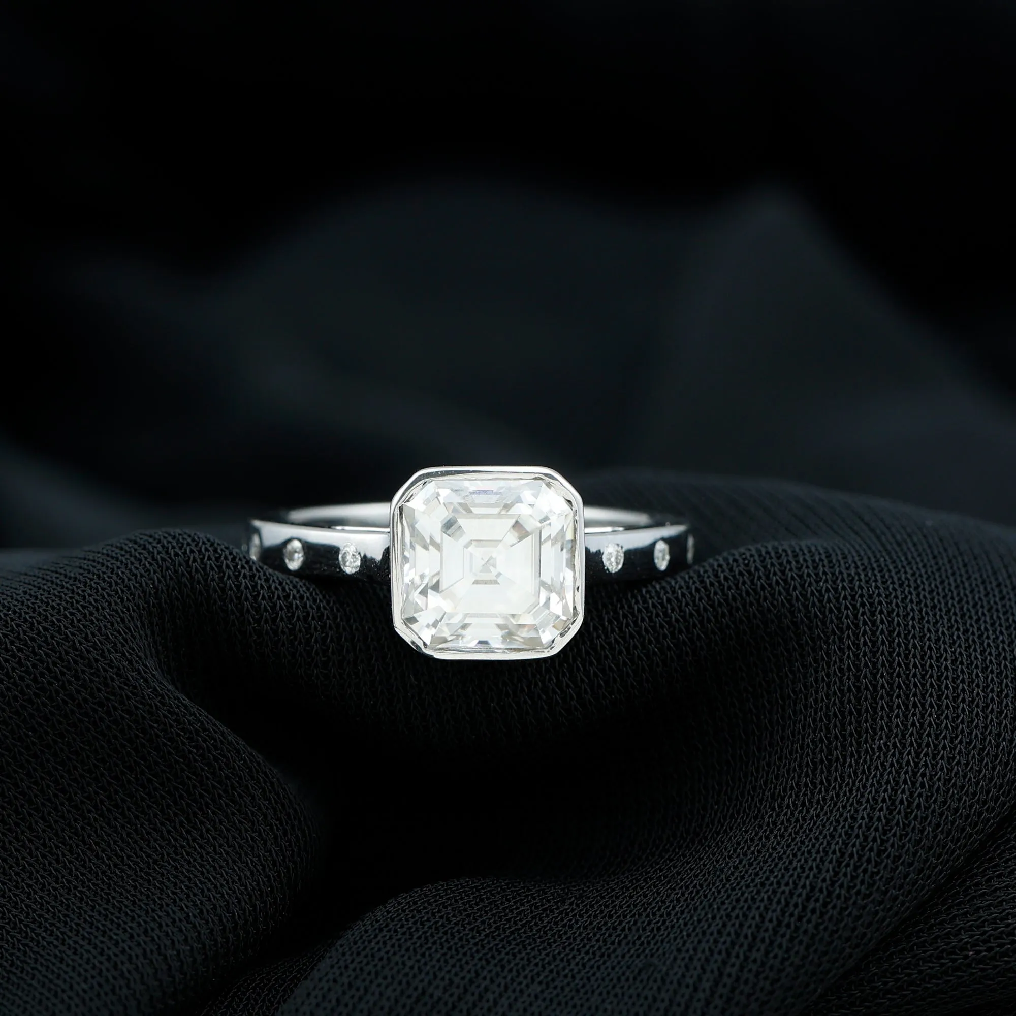 7 MM Asscher Cut Moissanite Solitaire Ring in Bezel Setting with Sleek Accent
