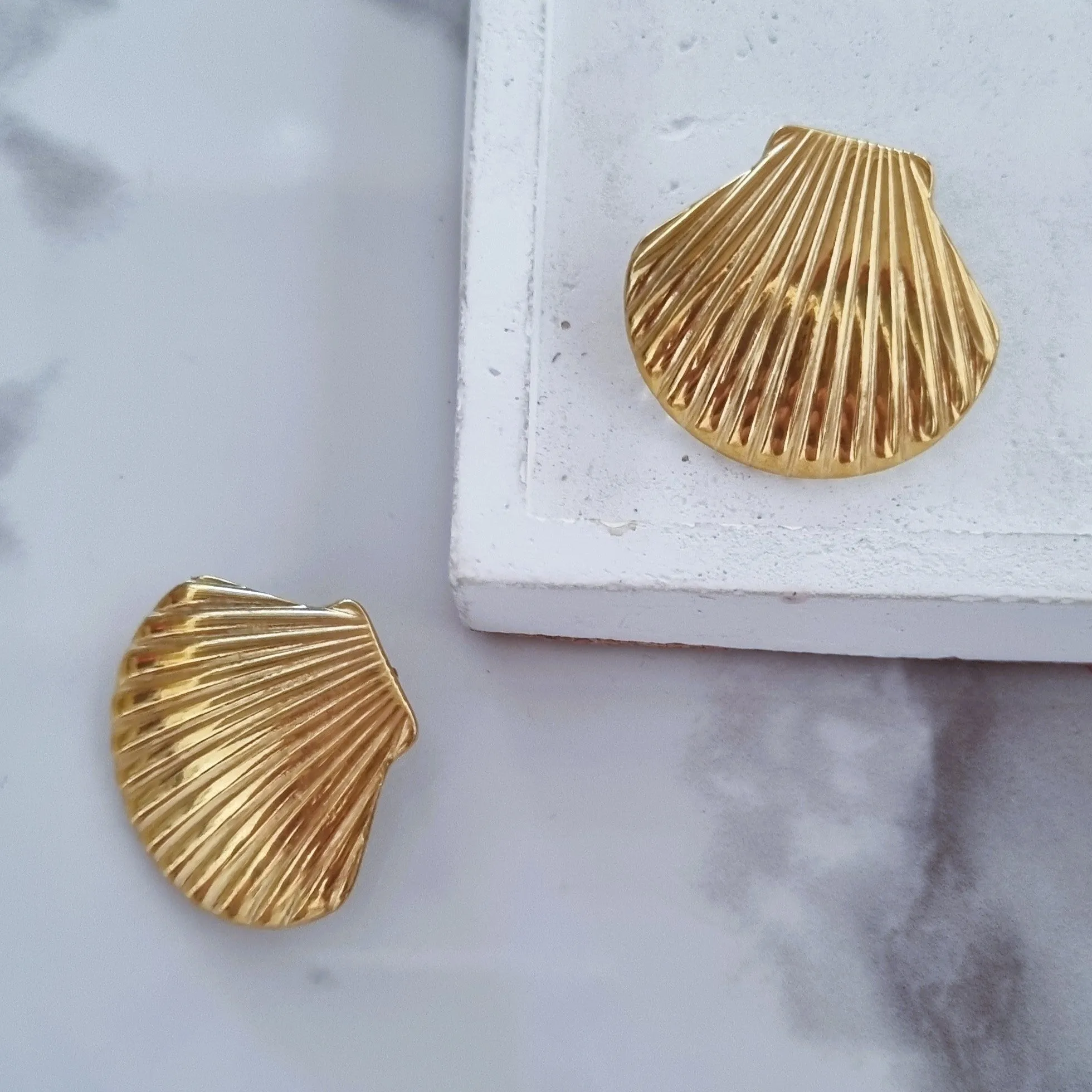 Gold shell earrings