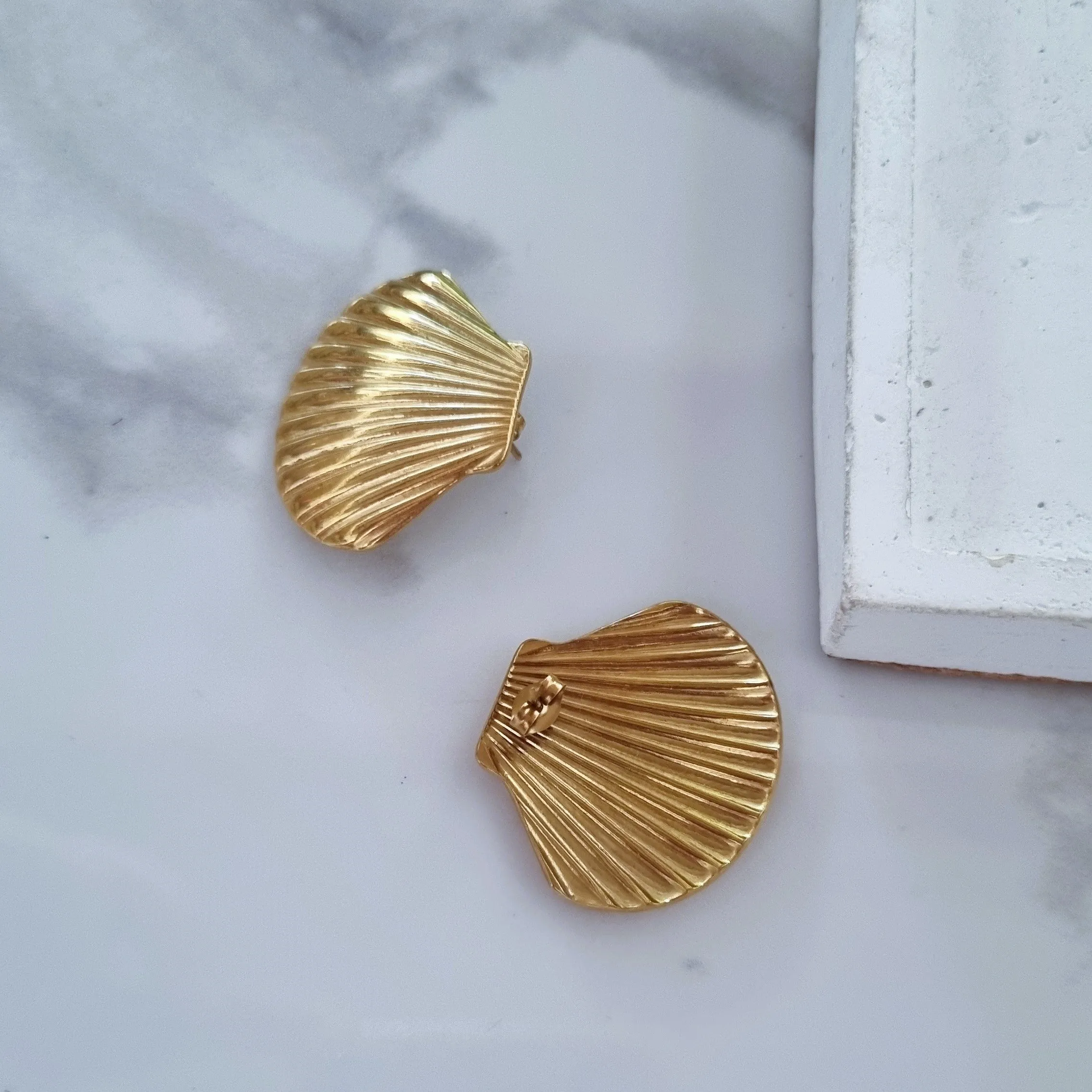Gold shell earrings