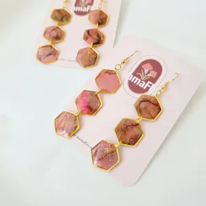 Trés Hex Dangle Earrings in marbled pinks