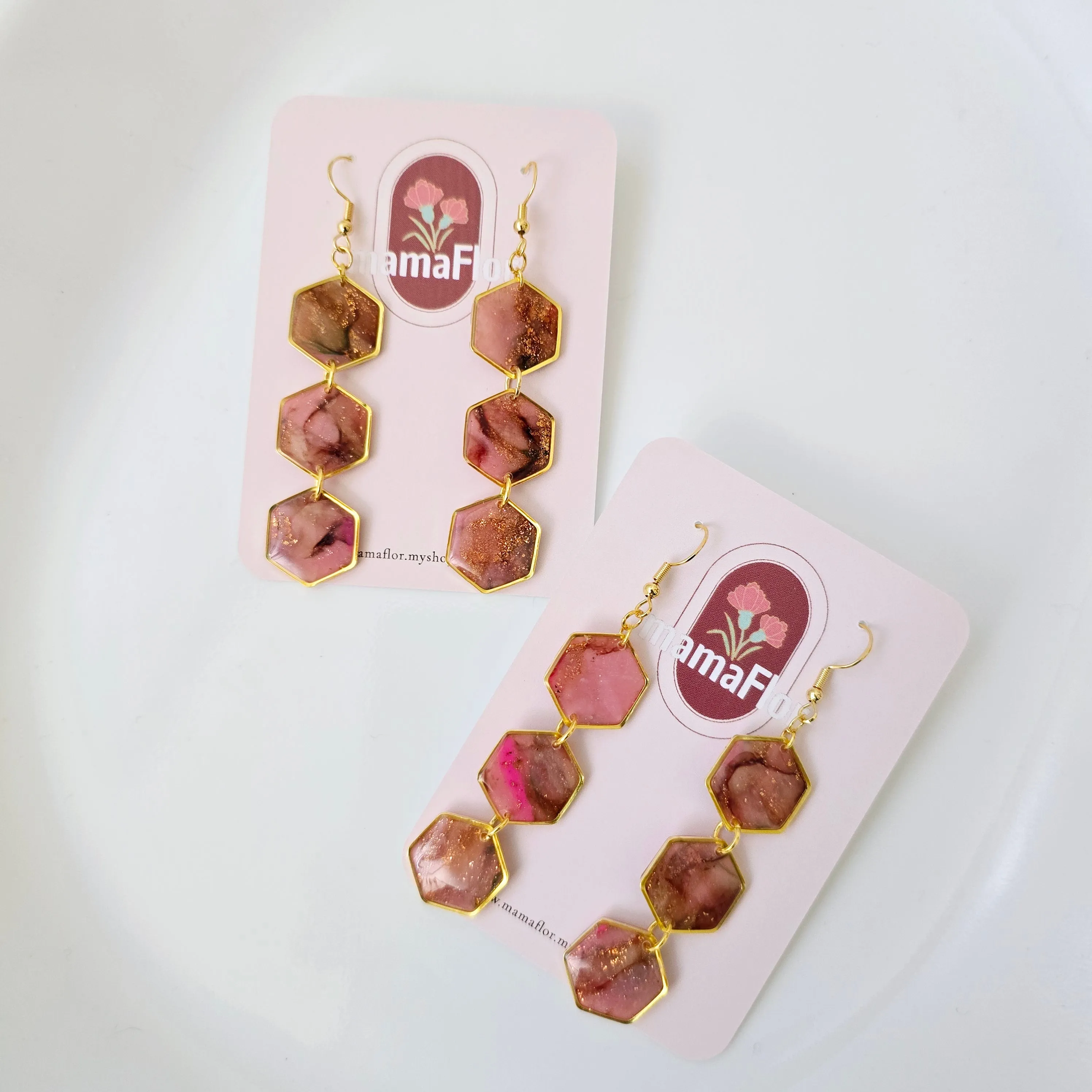 Trés Hex Dangle Earrings in marbled pinks