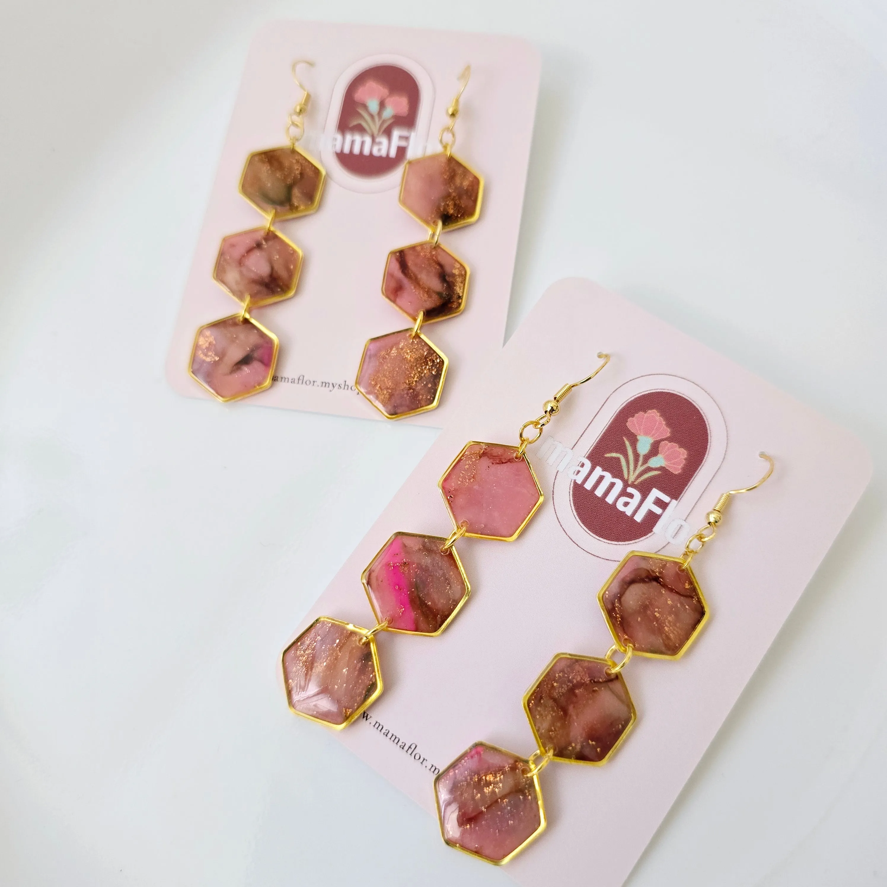 Trés Hex Dangle Earrings in marbled pinks