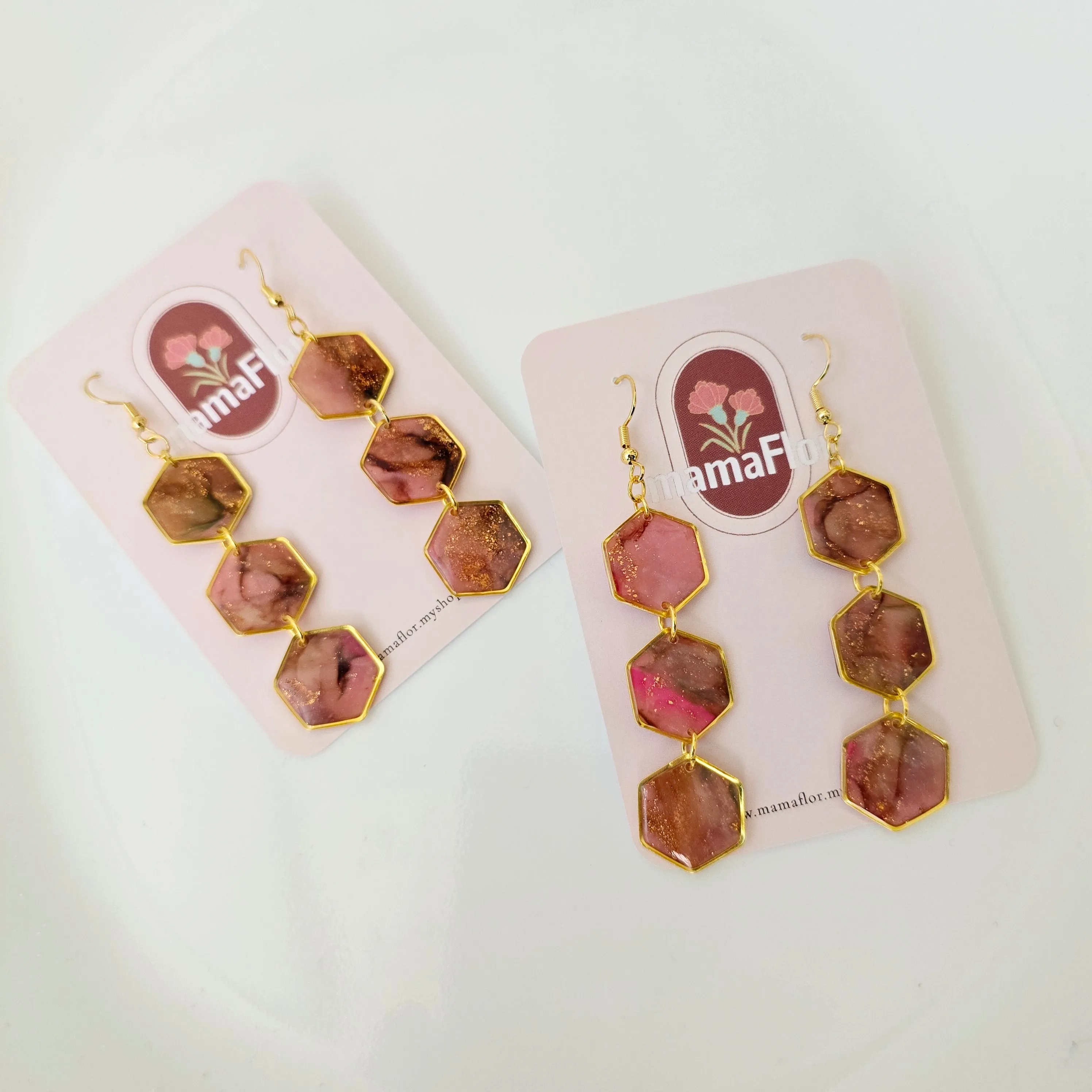 Trés Hex Dangle Earrings in marbled pinks